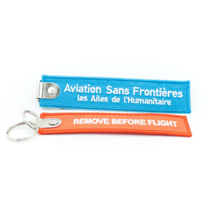 2 porte-clés flamme Aviation Sans Frontières "REMOVE BEFORE FLIGHT"